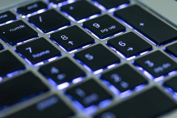 istock laptop keyboard numeric pad with blue lighting close-up 1475124203