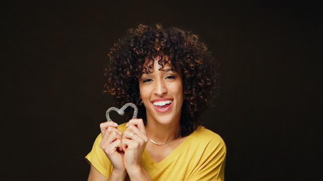 Happy Young Woman Holding Inivisible Teeth Aligners