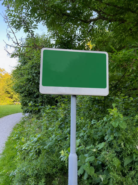 istock Blank signboard in beautiful park on sunny day. Space for design 1475125885