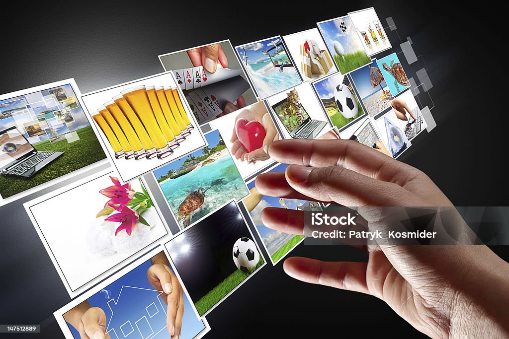 Streaming multimedia screen Hand reaching images on the virtual screen - all used pictures are coming from my gallery. Adult Stock Photo