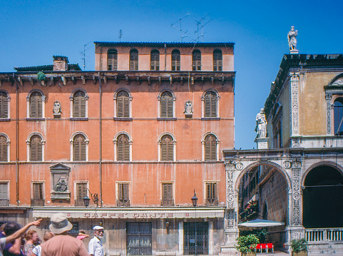 Verona, Italy - July 9, 1989: 1980s old Positive Film scanned, Tourists are visiting Piazza dei Signori, Verona, Italy.