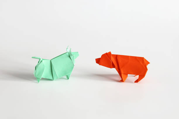 istock Bull vs bear, Origami figures, symbol trading on exchange, on white background 1475130670
