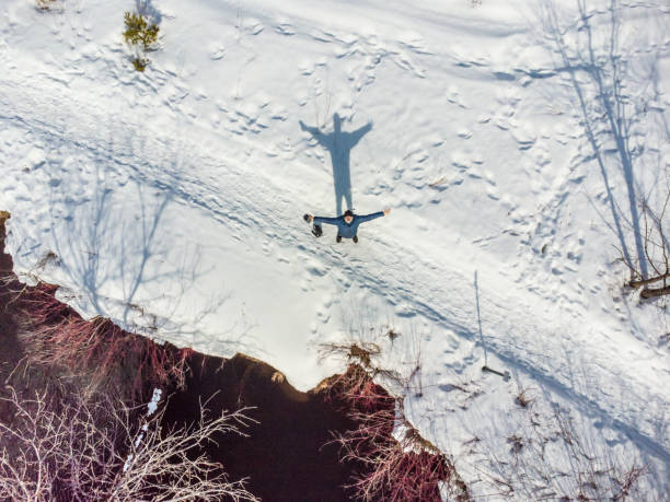 Aerial view of man piloting drone