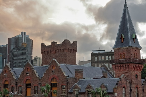 The ASN Co.building from 1885 in Pre-Federation Anglo-Dutch style, office and warehouse of the extinct Australasian Steam Navigation Company, modern skyscrapers in back. The Rocks-Sydney-NSW-Australia