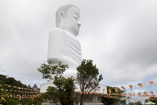 White Buddha statue at the Linh Ung Pagoda in the Ba Na Hills, Vietnam.