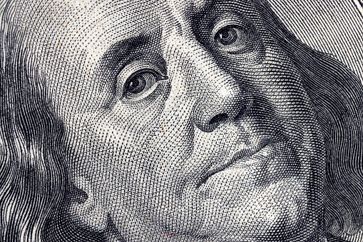 close-up of one hundred American dollars, details of 100 American dollars in cash