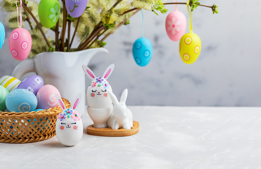 Closeup shot of cute Easter bunnies and Easter decoration. Happy Easter. Easter background image. Easter bunny.