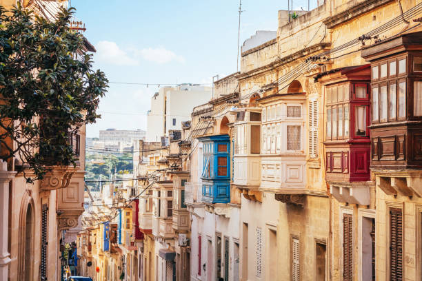 Old town street and colorful balconies in Sliema, Malta