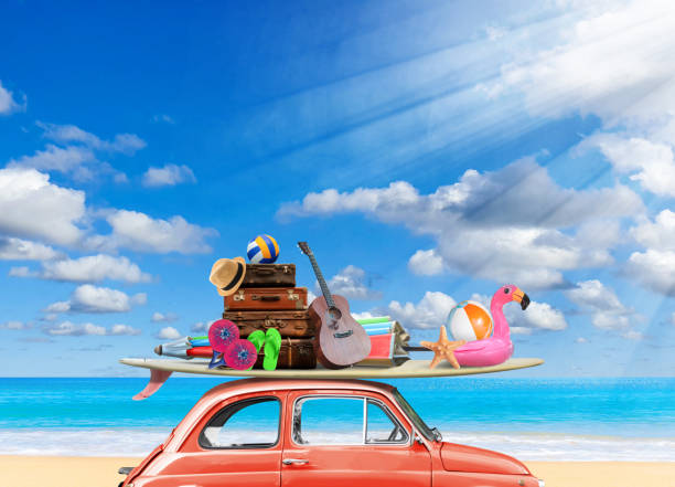istock Red Vintage old-fashioned car with Surfboard and beach stuff on beach in sunny 1475145956