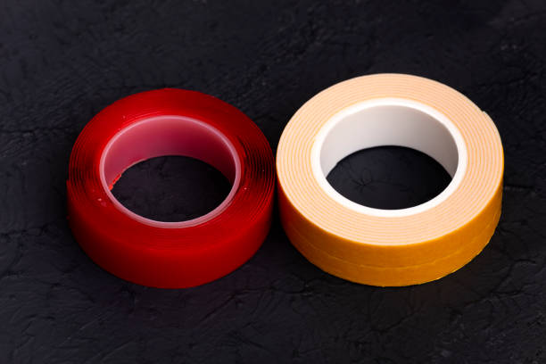 zwei elektrobänder - duct tape adhesive tape clipping path adhesive bandage stock-fotos und bilder