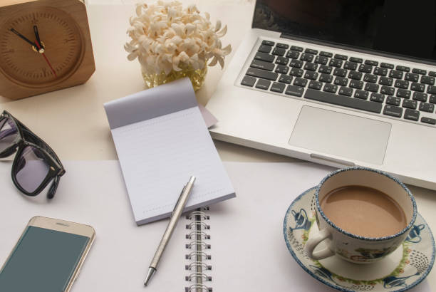 istock Relaxing office space for work on a white table by the balcony. 1475152390