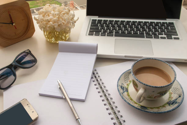istock Relaxing office space for work on a white table by the balcony. 1475152393