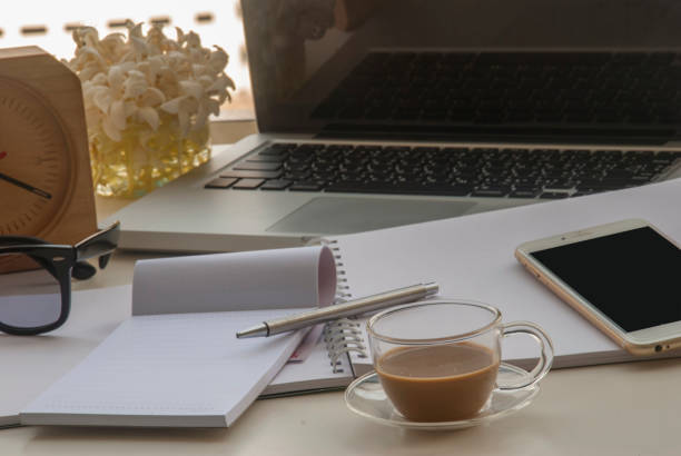 istock Relaxing office space for work on a white table by the balcony. 1475152396