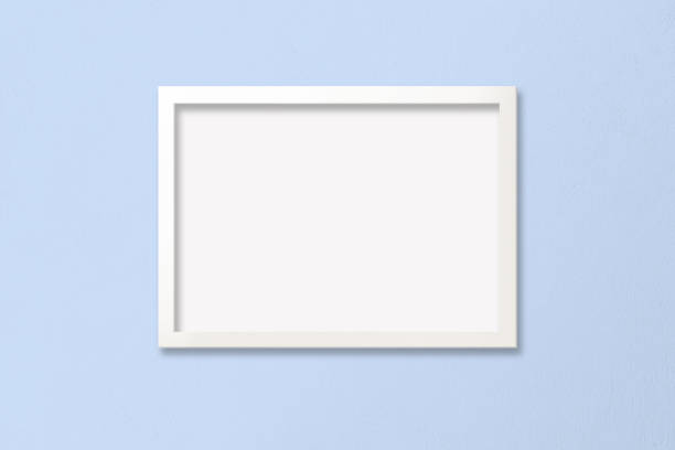 istock Poster Mockup with White Frame on Baby Blue Background 1475152457