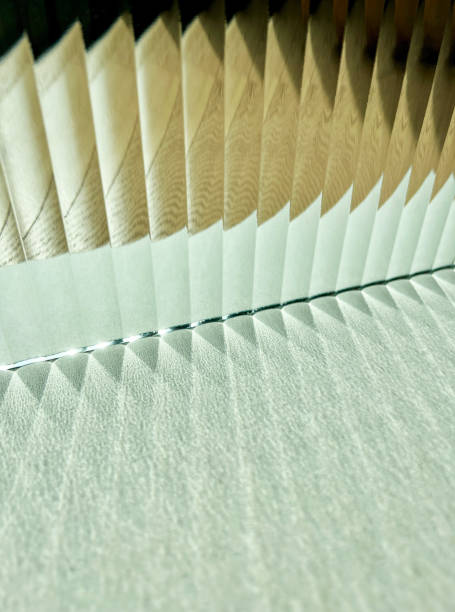 Daylight through the corrugated glass refracted to shade and shadow. Light refraction. Natural light come through fluted glass clear corrugated glass creating distorted image of outside and reflection and refraction of light. Mixture of triangle shade and shadow. Light refraction. frosted glass door office stock pictures, royalty-free photos & images