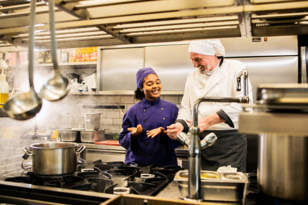 istock Young American woman undergoing training at a restaurant 1475156145