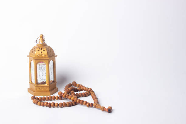 istock Decorative Arabic lantern with burning candles on a white background. 1475157727