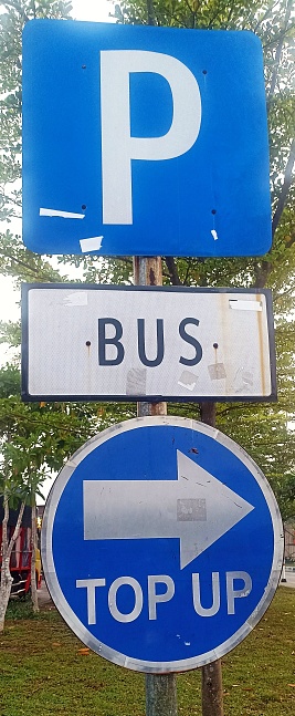 Blue parking sign in nature with right arrow. And top up