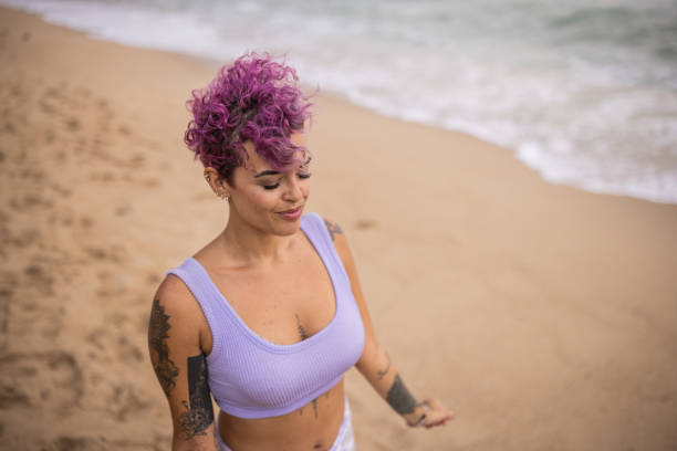 istock Woman enjoying sea breeze 1475163148