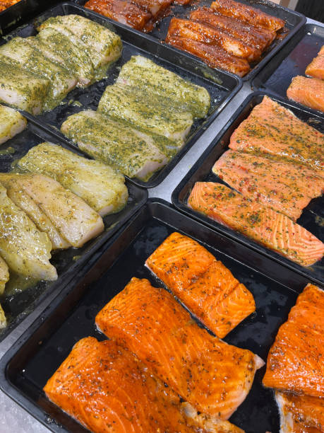 istock Assorted marinated salmon fillet pieces now available at the fish market 1475164353
