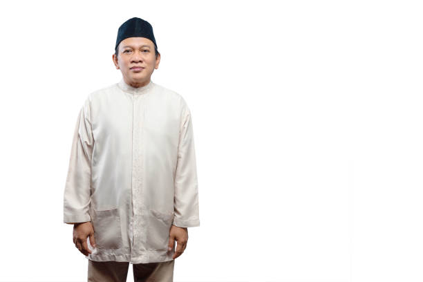 Asian Muslim man standing isolated over white background