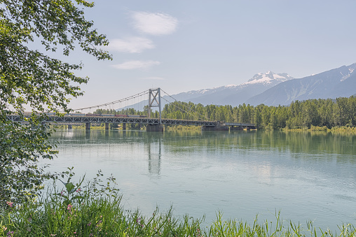 Landscape of the Columbia River and the Revelstoke Suspension Bridge, British Columbia, Canada