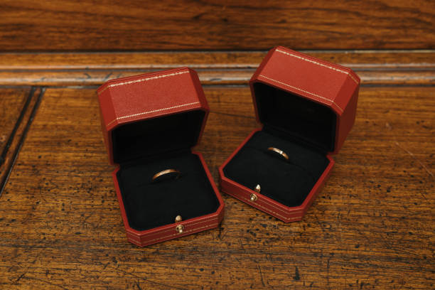 istock Golden wedding rings in Cartier ring box 1475169618