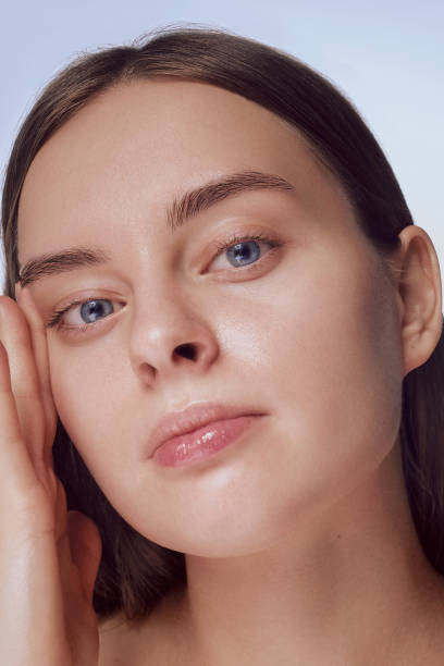 istock Model with clean fresh skin on white 1475171881