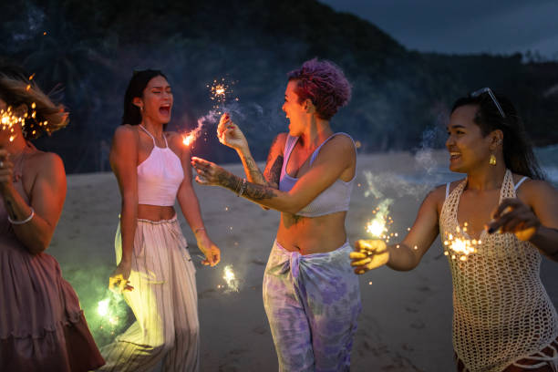 istock Friends having fun with sparklers 1475173184