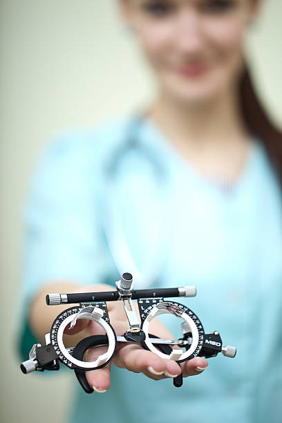 istock Trial frame in hands of a medical practitioner 147517510