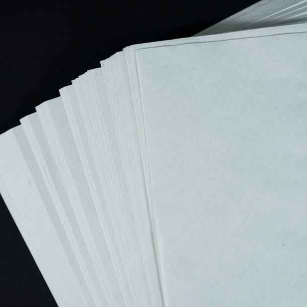 istock White Colored Paper. Photo of stack colored paper 1475180804