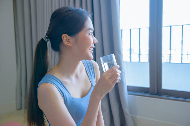 istock Asian girl exercising 1475183584