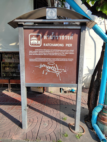 Sign at Ratchawong pier, a busy pier and gateway to Chinatown in Bangkok, Thailand.