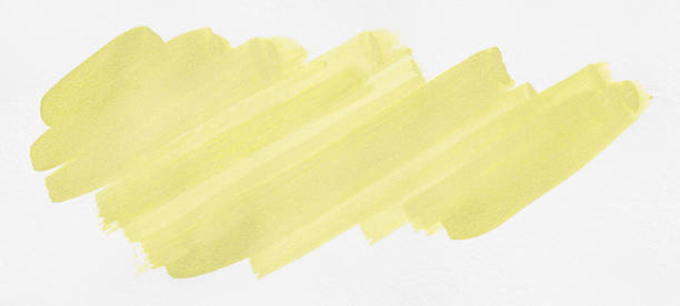 istock Light yellow brush isolated on white paper background. 1475187031