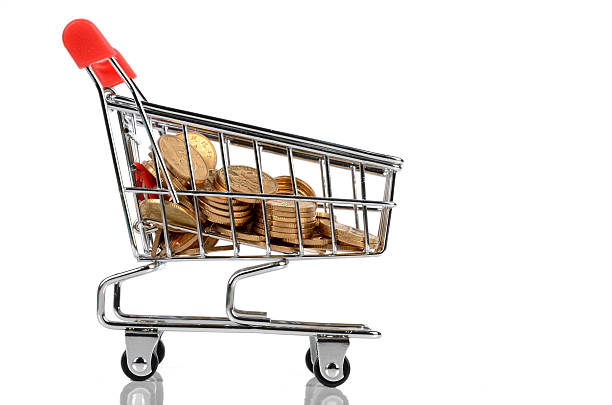istock Coins in shopping cart 147518755