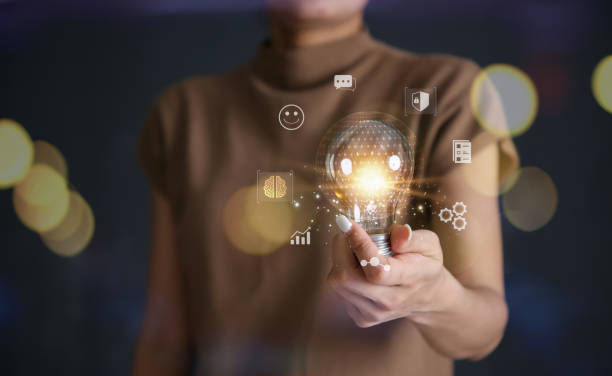 istock Hand holding light bulb. idea concept with innovation and inspiration 1475190021