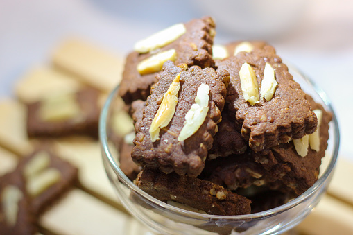 Almond Chocolate Cookies in a glass container