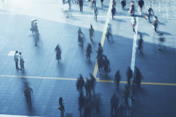 istock Many people walking in the downtown area 1475192833