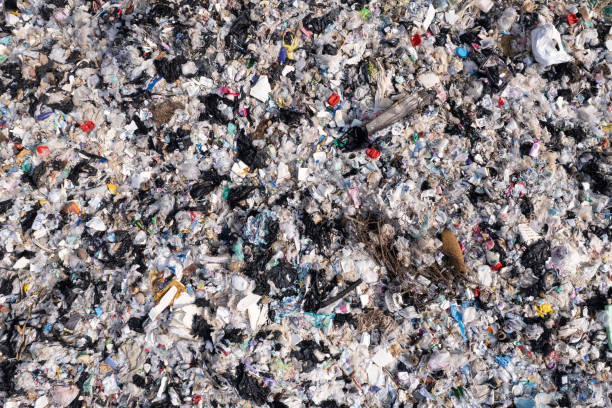 istock Aerial view, piles of garbage, plastic bottles and garbage. waste sorting facility Concept of waste disposal and waste separation to preserve the environment and save the world. 1475199499
