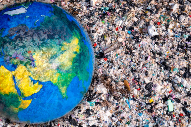 istock Aerial view, earth and piles of garbage, plastic bottles and garbage. waste sorting facility Concept of waste disposal and waste separation to preserve the environment and save the world. 1475199540