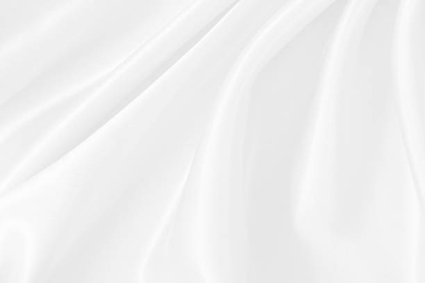 istock White fabric texture background, detail of silk or linen pattern. 1475203548