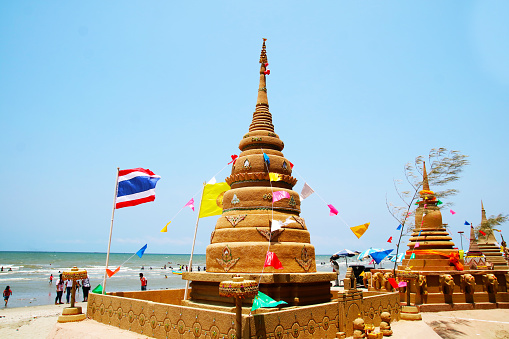 sand pagoda and wall in Songkran festival represents In order to take the sand scraps attached to the feet from the temple to return the temple in the shape of a sand pagoda