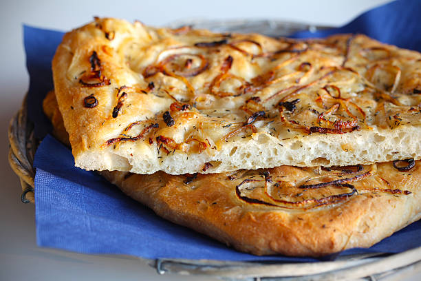 Focaccia bread with onions and thyme stock photo
