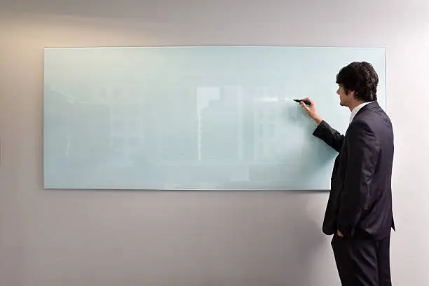 Photo of Writting on glass board