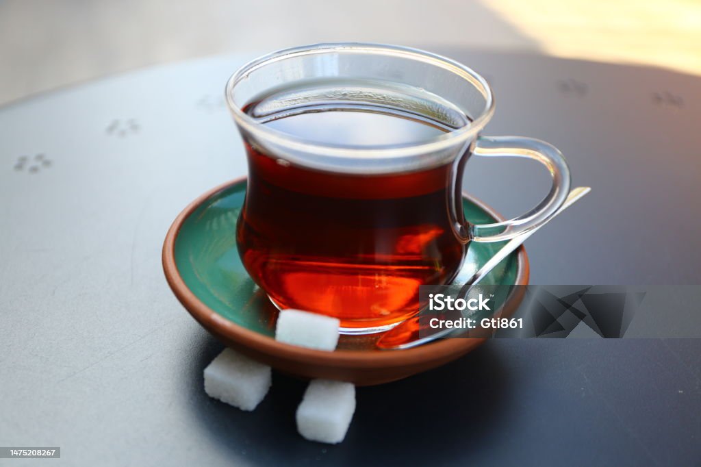 Tea Serving Black tea serving style. Tea and coffee shop in Istanbul. Accuracy Stock Photo