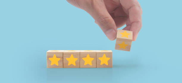 istock Wooden cubes in hand with copy space for input wording 1475210610