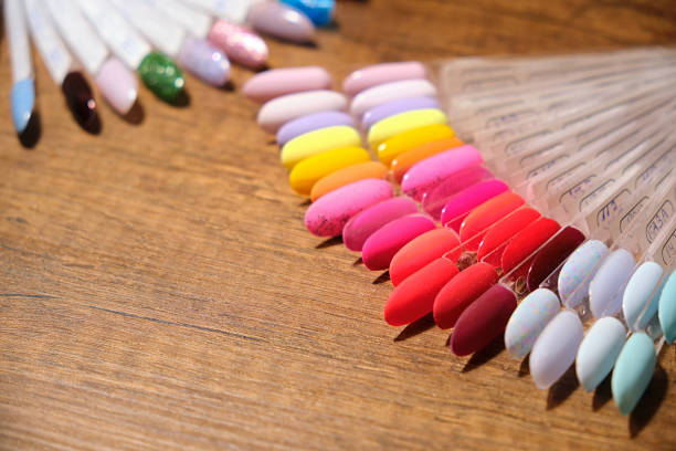 istock Close-up palette with nail color and texture samples for manicure. 1475211417