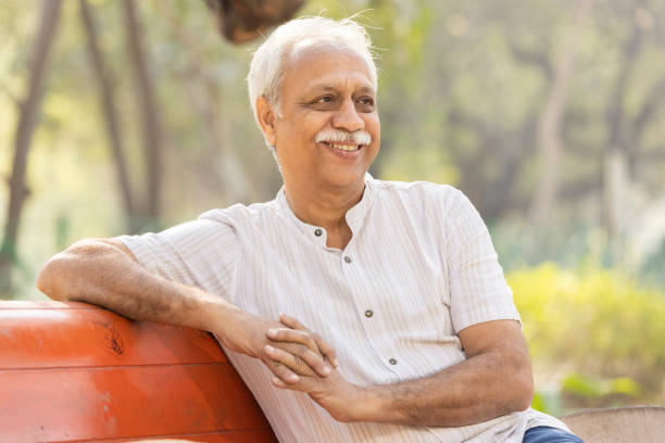 istock Happy senior man at park 1475212228