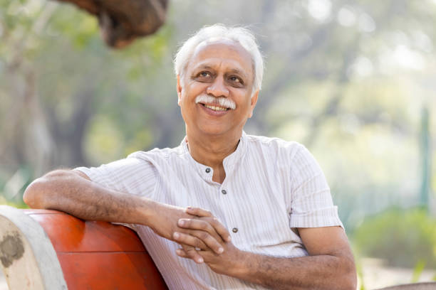 istock Happy senior man at park 1475212767