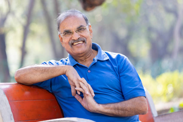 istock Happy senior man at park 1475212780